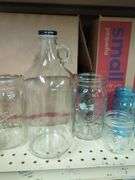Home Canning Supplies Including Ball Jars, Jug, Book, and Accessories