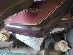 Honda Goldwing Motorcycle Parts Including Fuel Tank, Exhaust, And Air Filters