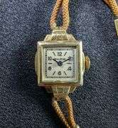 Four Assorted Wristwatches: Freedagar, Geneva, and Bulova With 10K Rolled Gold Plate
