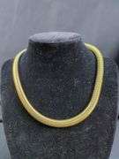 Collection of Nine Gold-Tone Fashion Necklaces - Avon and Monet