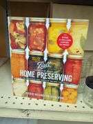 Home Canning Supplies Including Ball Jars, Jug, Book, and Accessories