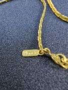 Collection of Nine Gold-Tone Fashion Necklaces - Avon and Monet