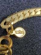 Collection of Nine Gold-Tone Fashion Necklaces - Avon and Monet