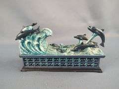 PuzzleMakers International Cast Iron Mechanical Dolphins Bank