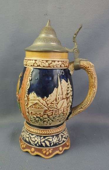 German Beer Stein with Pewter Lid and Relief Decoration