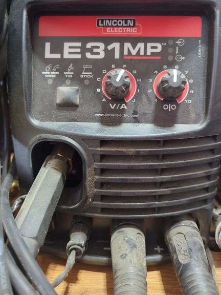 Lincoln Electric Welder With Helmets, Gloves And Nozzle Gel