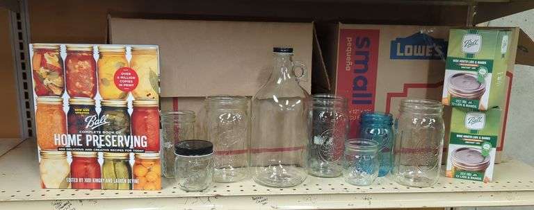 Home Canning Supplies Including Ball Jars, Jug, Book, and Accessories