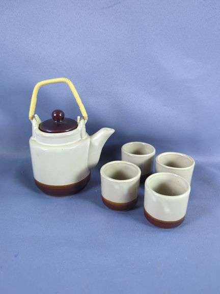 Variety of Vases, Teapots, and Cups
