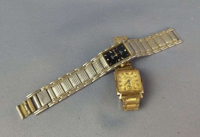 Bulova Diamond Quartz Watch, Marked On Back 18K Gold No. 2120 Swiss Made, And Bulova 23 Jewels Watch, Marked 10K Rolled Gold Plate