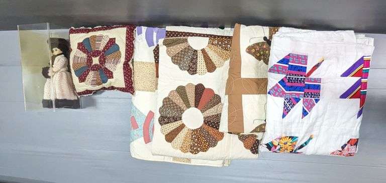 Quilts, Pillow, and Porcelain Doll