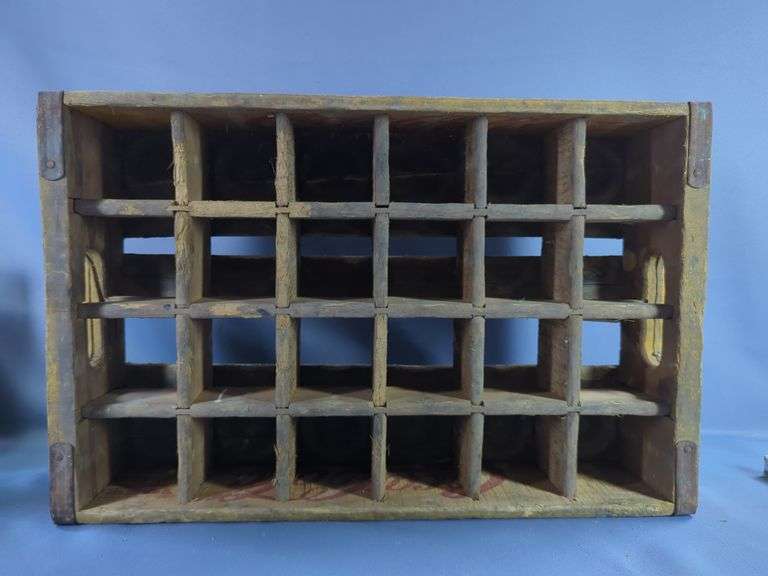 Assorted Vintage Soda Bottles In Coca-Cola Crate