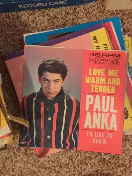 Collection of 45 RPM Records with Cases Including Elvis Presley, Shaun Cassidy, and More