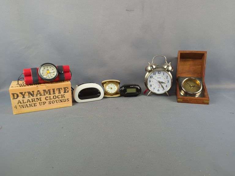 Variety of Alarm Clocks Including 'Dynamite' Clock and Wood Cased Clock