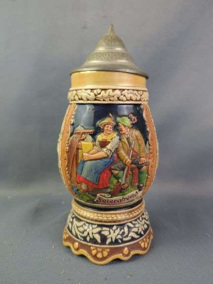 German Beer Stein with Pewter Lid and Relief Decoration