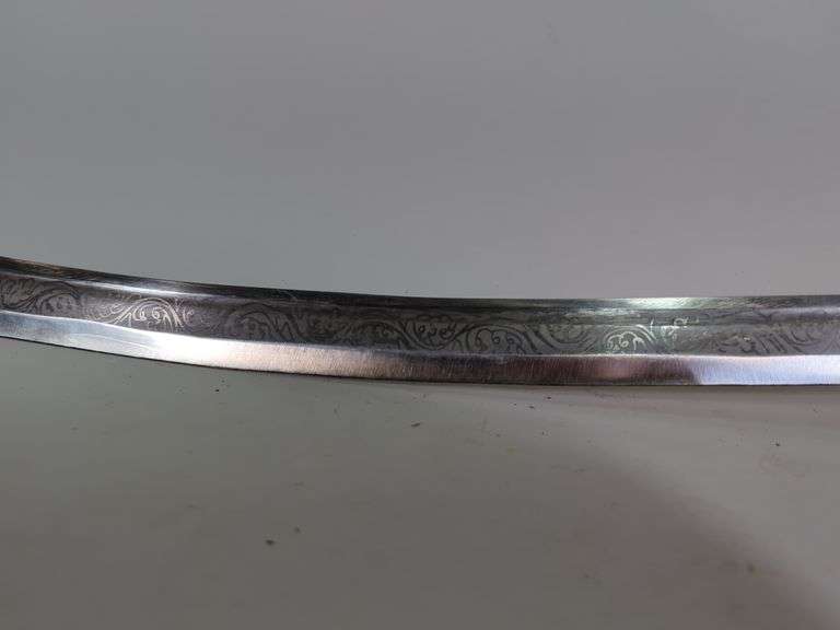 Sword Made In India With Embossed Blade, Brass Guard, And 'Deg Tegh Fateh' Written On Blade (Victory To Charity And Arms In Punjabi), 13.5" Blade, In Scabbard