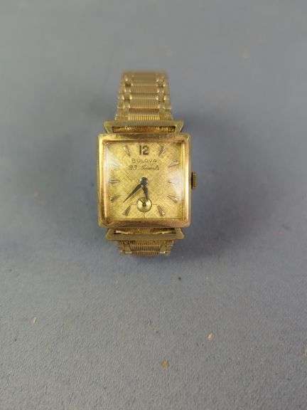 Bulova Diamond Quartz Watch, Marked On Back 18K Gold No. 2120 Swiss Made, And Bulova 23 Jewels Watch, Marked 10K Rolled Gold Plate