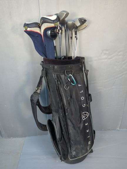 Nike Golf Bag with assorted Golf Clubs