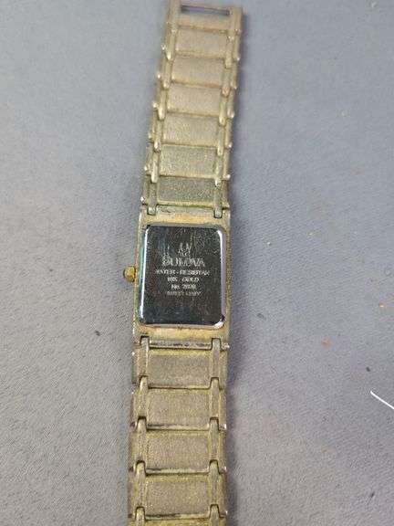 Bulova Diamond Quartz Watch, Marked On Back 18K Gold No. 2120 Swiss Made, And Bulova 23 Jewels Watch, Marked 10K Rolled Gold Plate