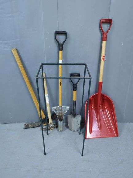 Variety of Shovels, Picks and a Metal Stand