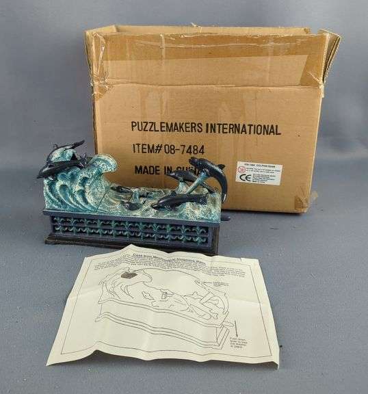 PuzzleMakers International Cast Iron Mechanical Dolphins Bank
