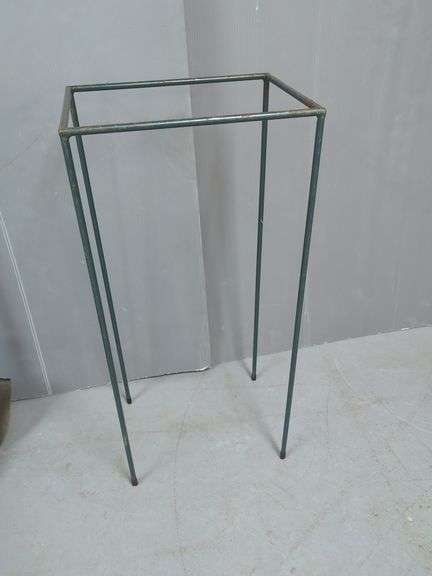 Variety of Shovels, Picks and a Metal Stand