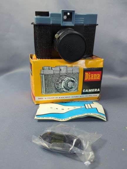 Diana and Banner Cameras with Boxes and Instructions