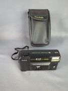 Polaroid Impulse SE, Kodak VR35, and Minolta Freedom Dual Cameras with Cases
