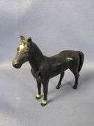 Cast Iron Dog Statue, Horse Figurine, Frog Trivet, and Bulldog Bottle Opener