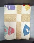 Quilts, Pillow, and Porcelain Doll