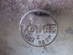 Lodge Cast Iron Grill Pan and Florence Stove And Range Co Number 8 Skillet