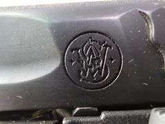 Smith & Wesson M&P10mm M2.0 10mm Auto Pistol SN# NMH2174, 2 Total Mags, Extra Grips, Paperwork, In Box