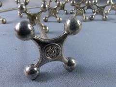 Silver-toned Knife Rests