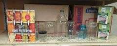 Home Canning Supplies Including Ball Jars, Jug, Book, and Accessories