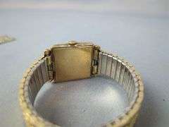 Bulova Diamond Quartz Watch, Marked On Back 18K Gold No. 2120 Swiss Made, And Bulova 23 Jewels Watch, Marked 10K Rolled Gold Plate