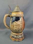 German Beer Stein with Pewter Lid and Relief Decoration