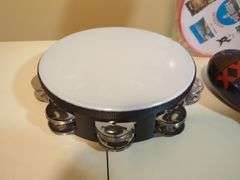 Percussion Instruments Including Remo Tambourine, Maracas, and Souvenir Tambourine