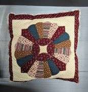 Quilts, Pillow, and Porcelain Doll