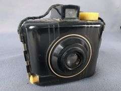 Collection of Cameras including Kodak Baby Brownie, Polaroid, Digital, and Flash Bulbs