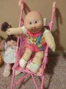 Cabbage Patch Kids Dolls, Qty 4 And Stroller