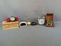 Variety of Alarm Clocks Including 'Dynamite' Clock and Wood Cased Clock