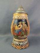 German Beer Stein with Pewter Lid and Relief Decoration