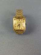 Bulova Diamond Quartz Watch, Marked On Back 18K Gold No. 2120 Swiss Made, And Bulova 23 Jewels Watch, Marked 10K Rolled Gold Plate