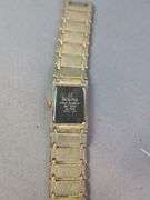 Bulova Diamond Quartz Watch, Marked On Back 18K Gold No. 2120 Swiss Made, And Bulova 23 Jewels Watch, Marked 10K Rolled Gold Plate