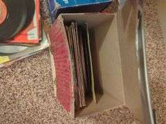 Collection of 45 RPM Records with Cases Including Elvis Presley, Shaun Cassidy, and More