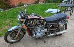 1975 Honda GL1000 Motorcycle, VIN GL11011122, Mileage Showing On Odometer 9146, Missouri Title, Including Various Motorcycle Parts, Speedometers, Tachometer, Carburetors, Fenders, Brake Pads And More,