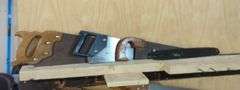 Lot of Four Hand Saws
