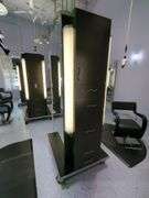 Double Sided Salon Styling Station With Rollout Storage And Power Supply On Casters