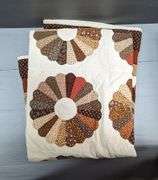 Quilts, Pillow, and Porcelain Doll