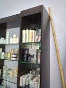 Salon 3-Section Display Cabinet With Mirrored Back, Glass Shelves And Lower Storage, Contents NOT Included, Friday Pick Up ONLY