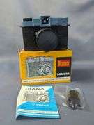 Diana and Banner Cameras with Boxes and Instructions